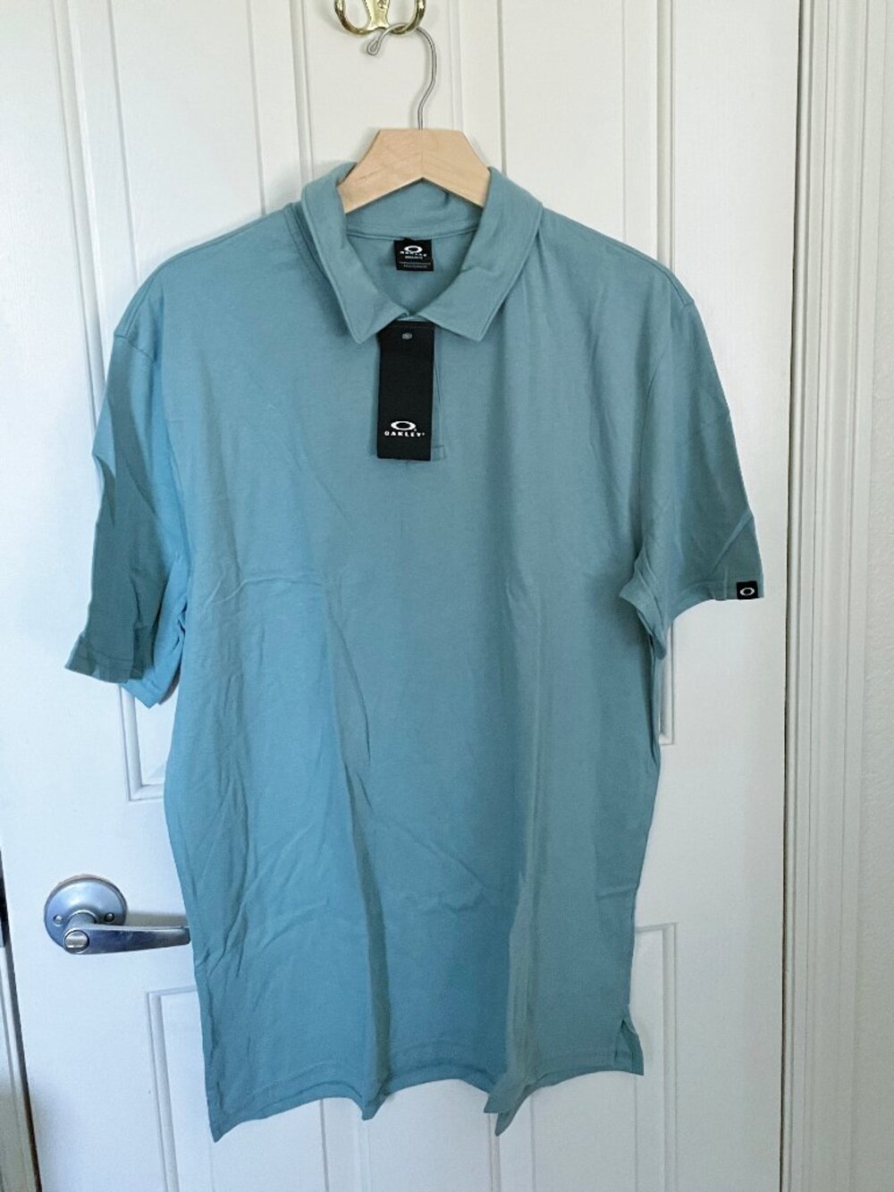 NEW Oakley Mens Transition Polo NWT L Pacific Hydrolix Moisture Wick Golf